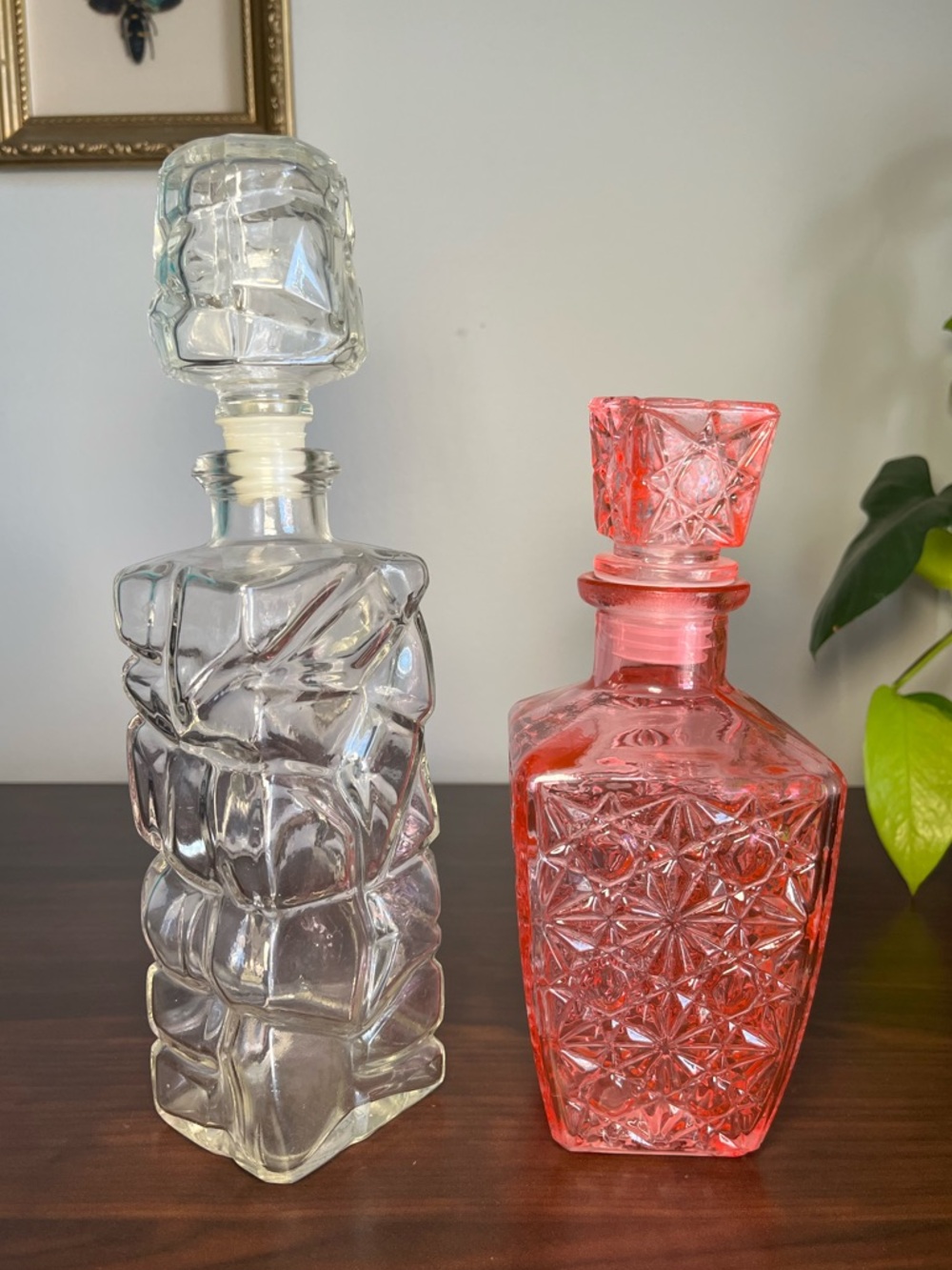 Set of 2 Vintage Glass Square Cut Liquor Decanters & Stoppers. The pink one glow